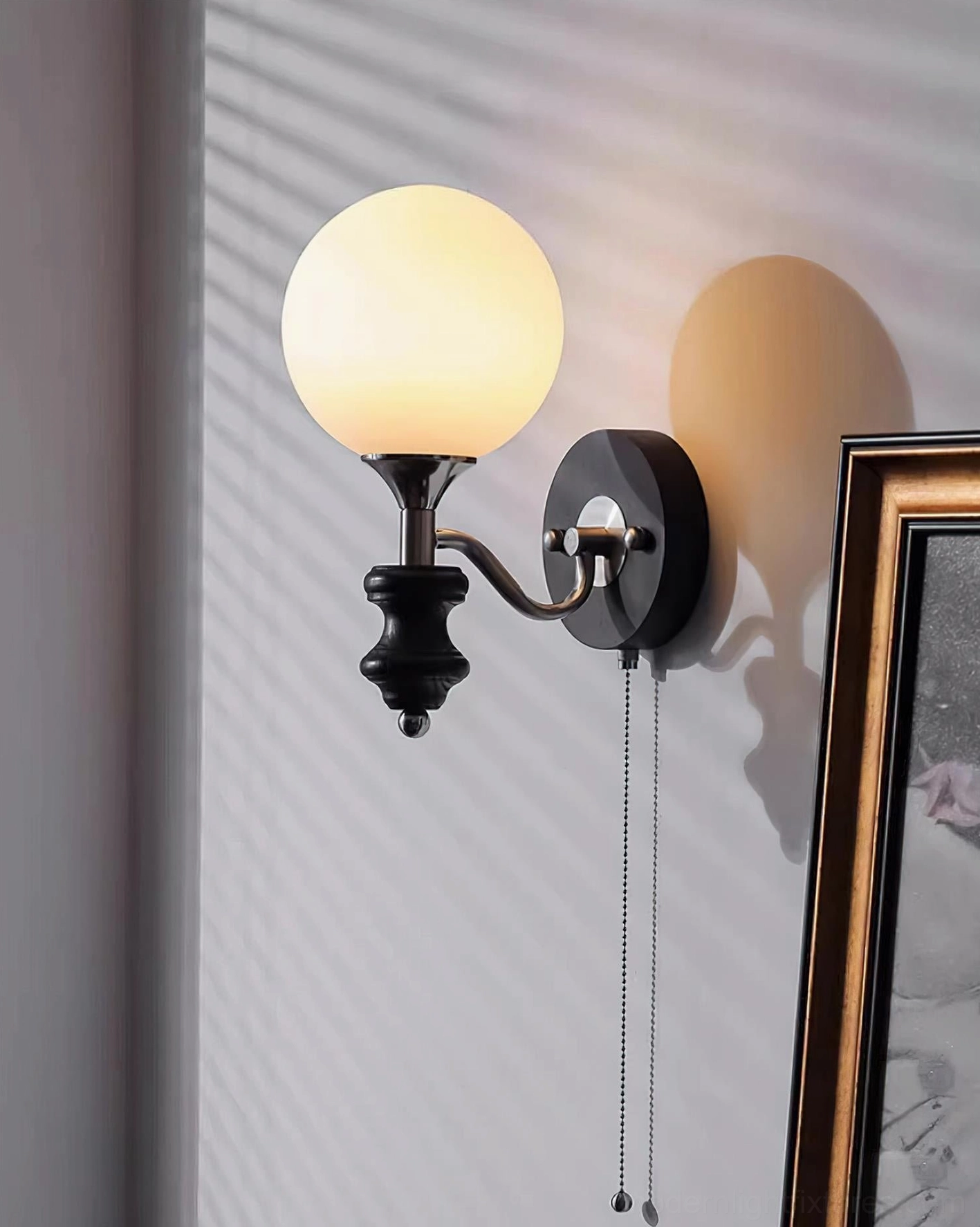 Illuminated retro spherical wall sconce with soft warm glow in home interior