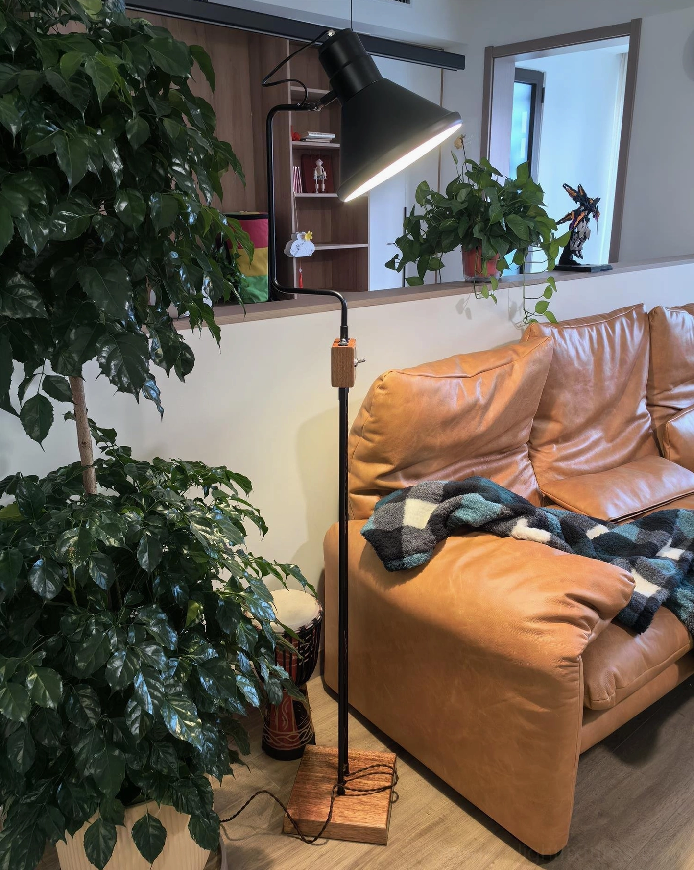 Vintage industrial floor lamp metal frame wooden base construction