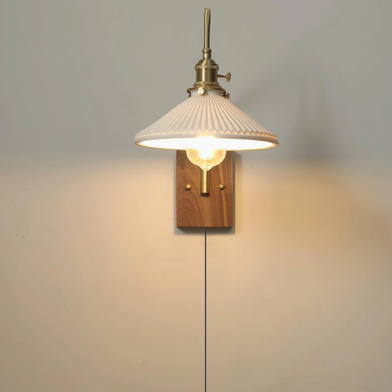 Retro wall sconce front view with fluted white ceramic shade, exposed Edison-style bulb, and brass hardware