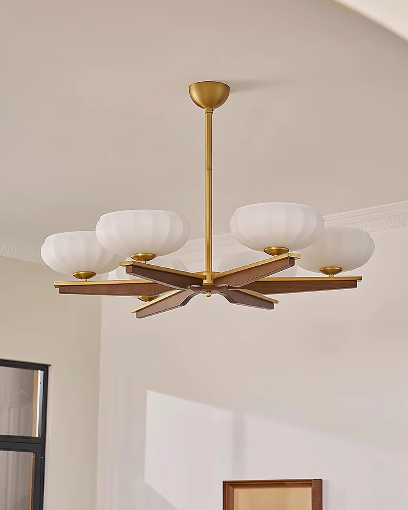 Reya mid-century modern chandelier with natural wood tones and polished metal accents, interior design focal point