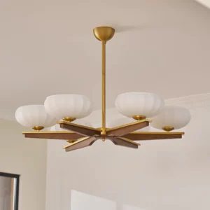 Reya mid-century wood chandelier with ribbed glass shades installed in residential interior, three-quarter view showcasing brass and walnut detailing