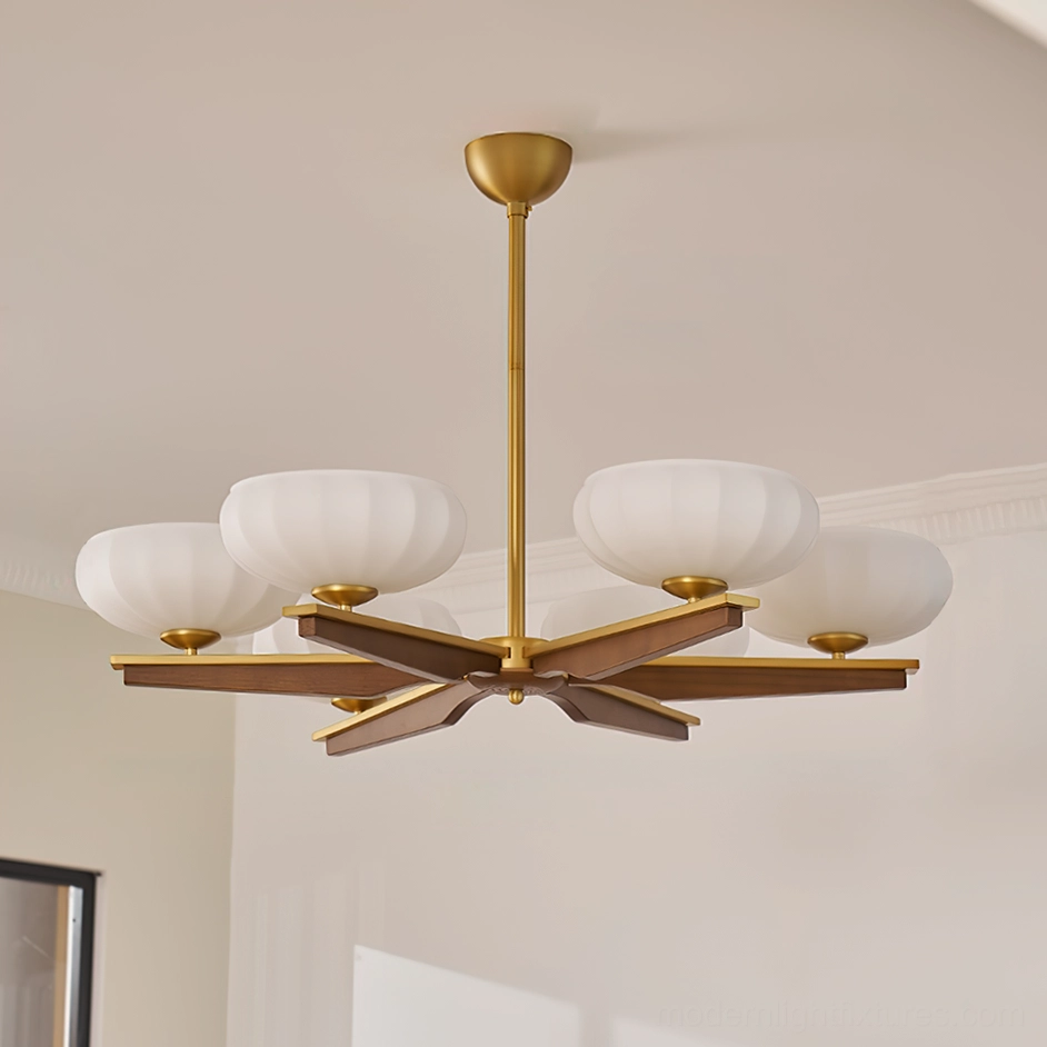 Reya mid-century wood chandelier with ribbed glass shades installed in residential interior, three-quarter view showcasing brass and walnut detailing