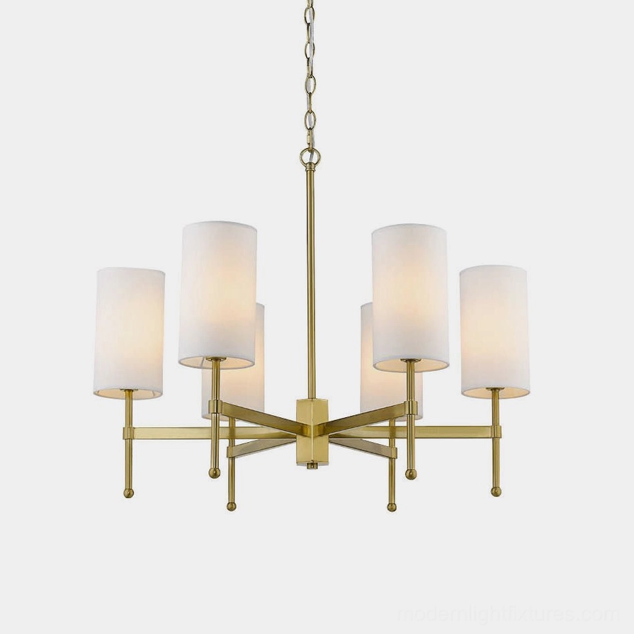 Rhodes mid-century modern chandelier with 6 brass arms and white cylindrical fabric shades on white background - front studio view