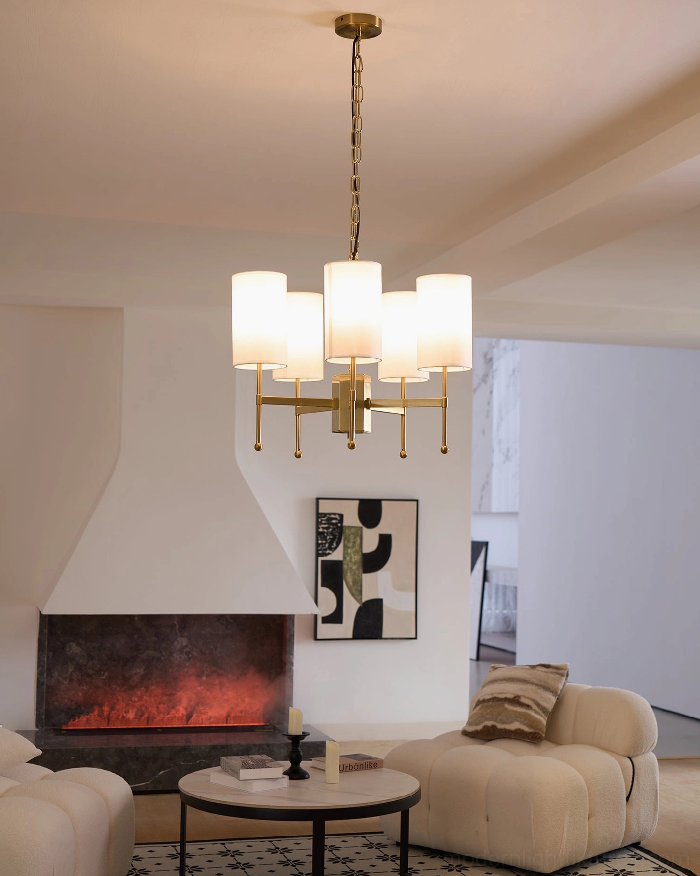 Rhodes chandelier showing scale and proportion in luxury residential living area - context view