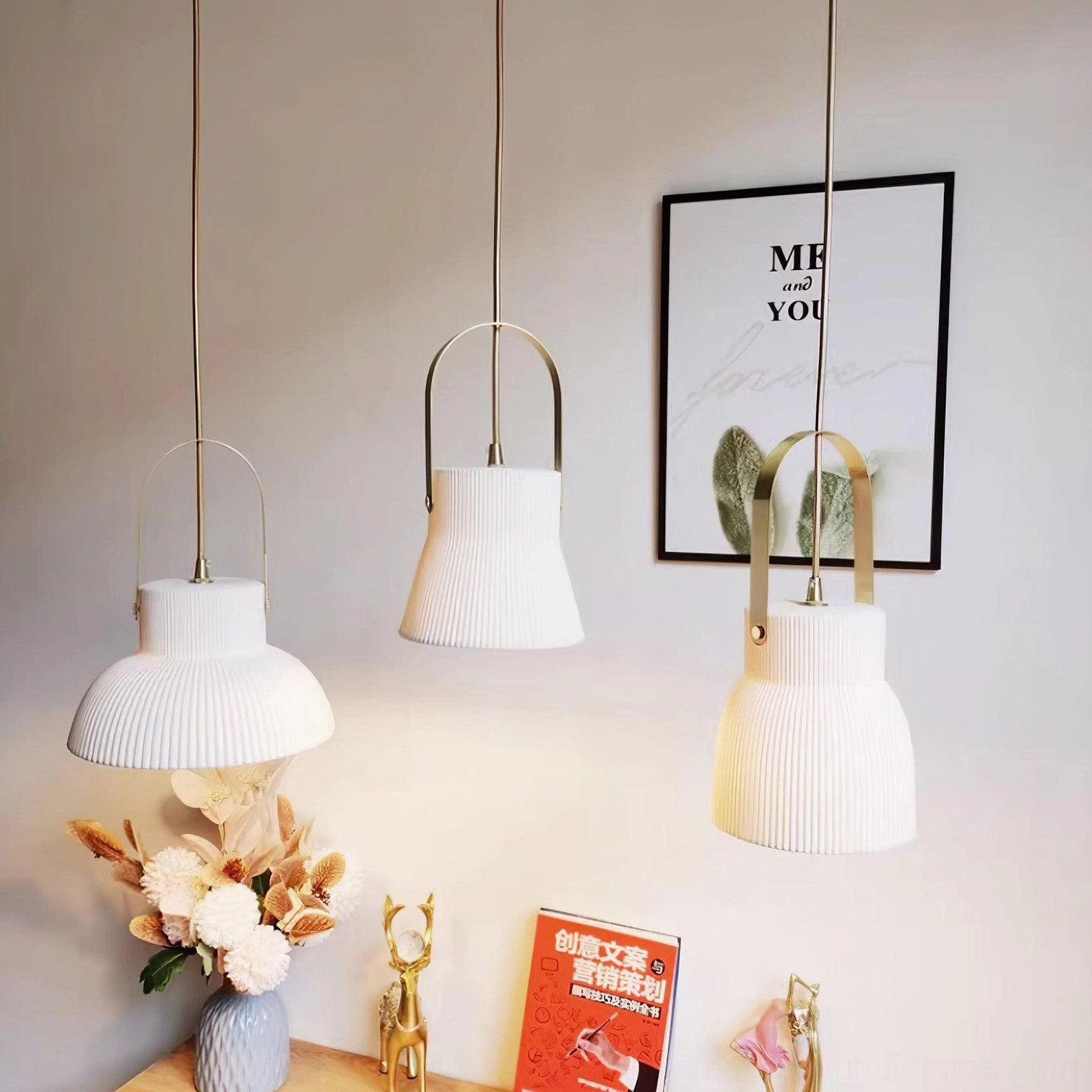 Ribbed ceramic pendant fixture creating sculptural focal point in designer space