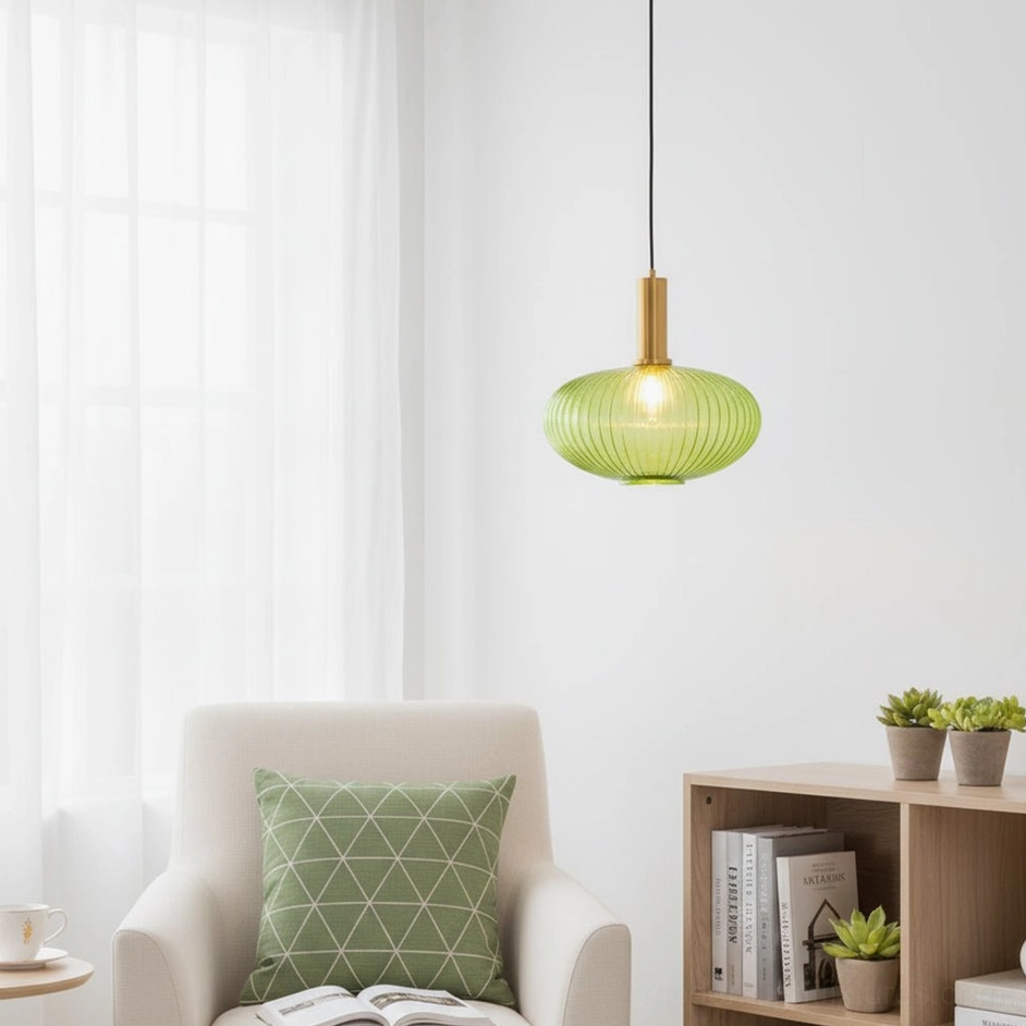 Interior view of ribbed glass pendant lamp illuminated at night showing soft diffused light and glass texture glow