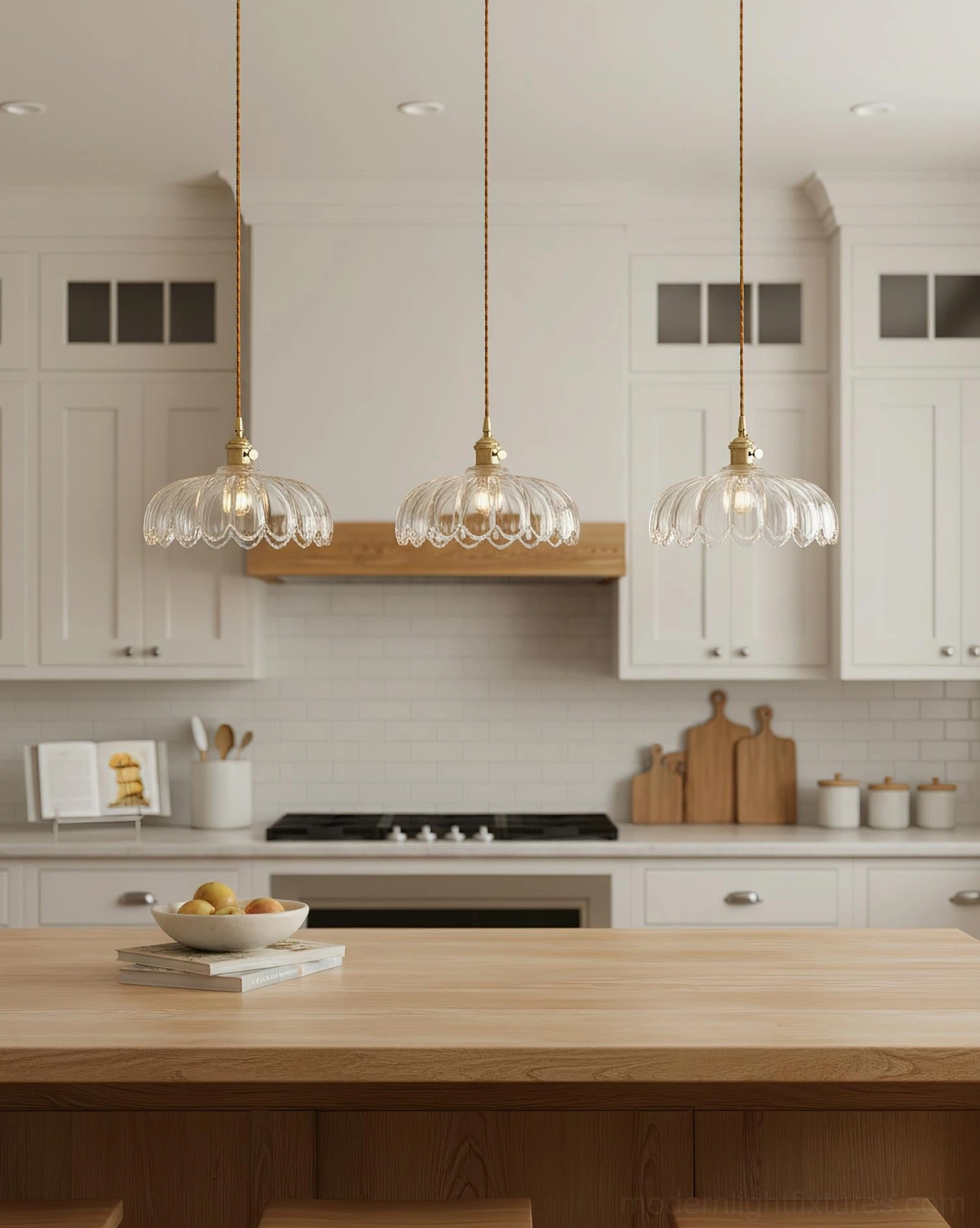 Glass pendant light with ribbed texture and warm brass suspension