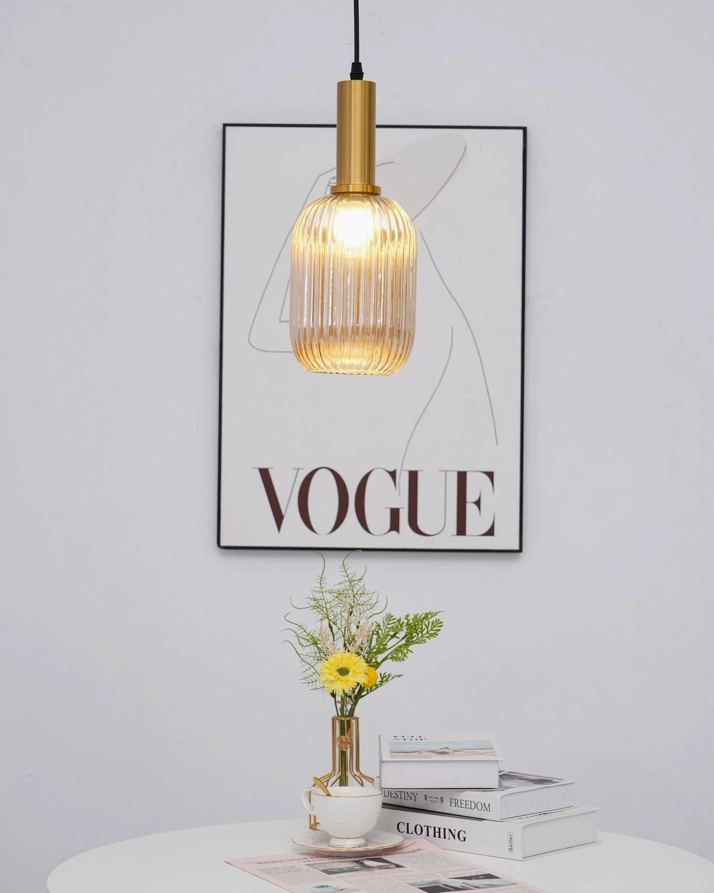 Single ribbed glass pendant lamp isolated view showing complete fixture design brass hardware and glass detail