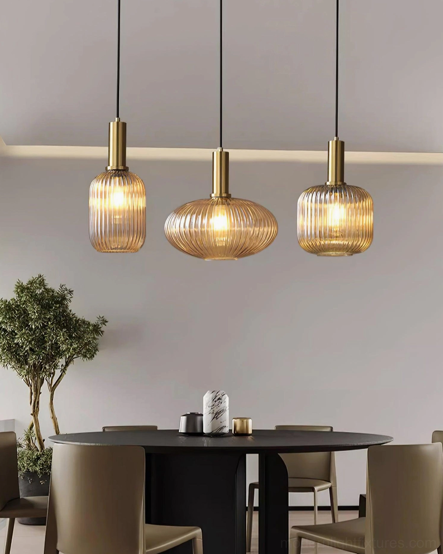 Contemporary interior showing ribbed glass pendant coordinated with ceramic base table lamp design harmony