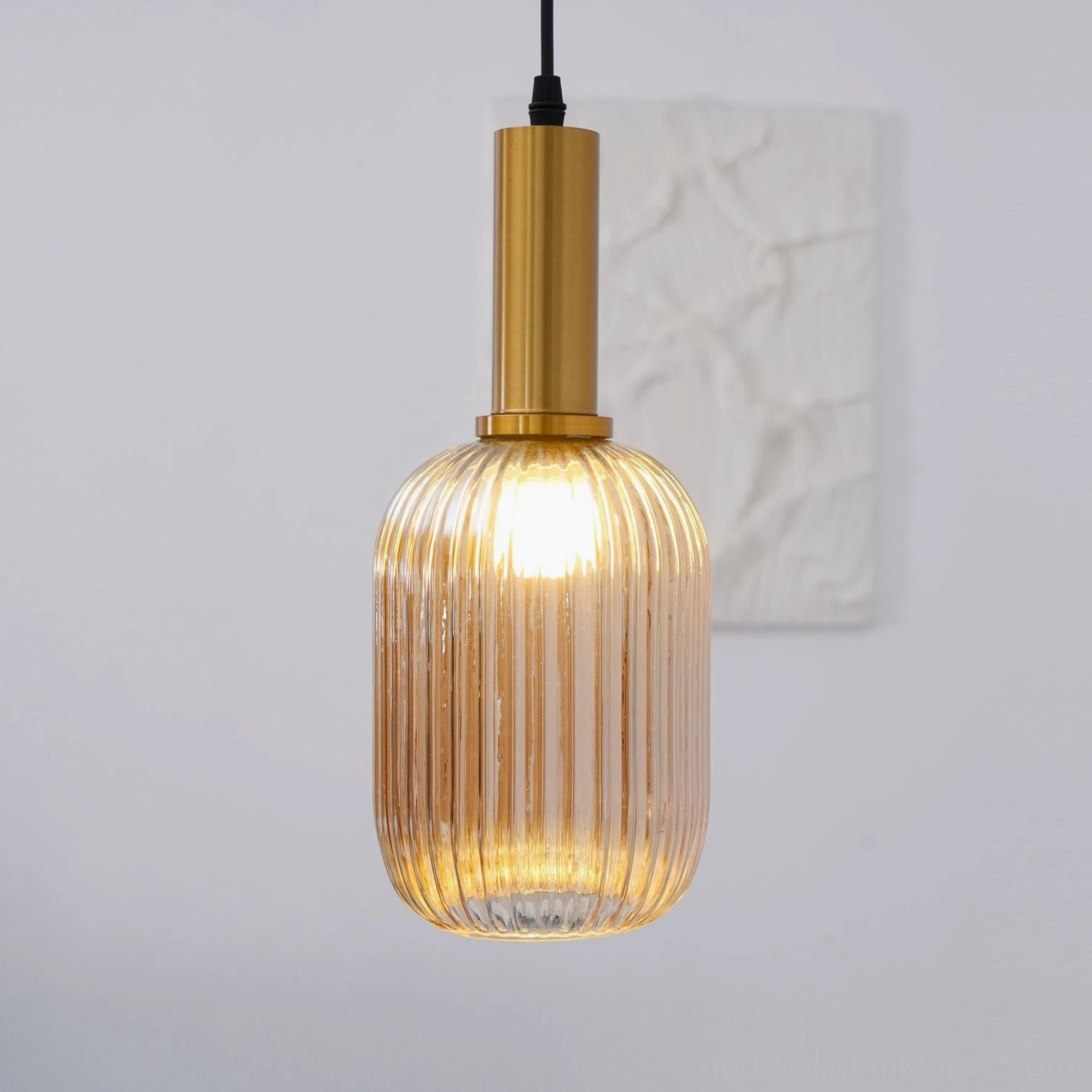 Ribbed glass pendant lamp interior cross-section view showing electrical components and socket installation