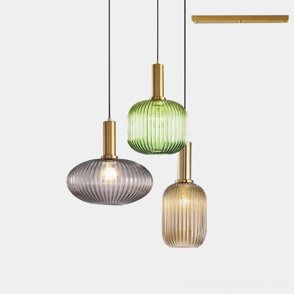 Three-head ribbed glass pendant fixture with long linear canopy L 50cm x W 6cm multiple fixture installation