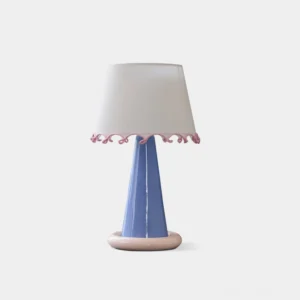 Pastel ribbon ceramic table lamp with gradient blue base and off-white ruffled shade, direct front view on white background