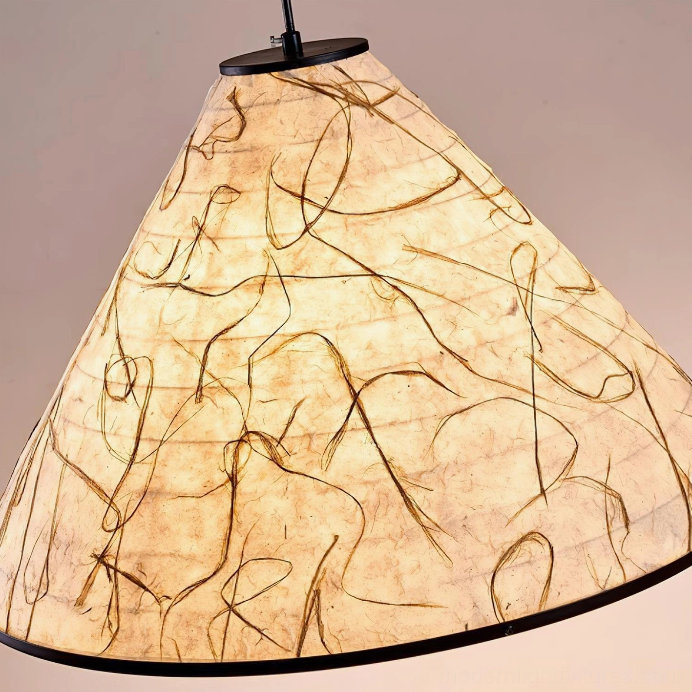 Cone pendant lamp displaying warm light diffusion through handcrafted rice paper material