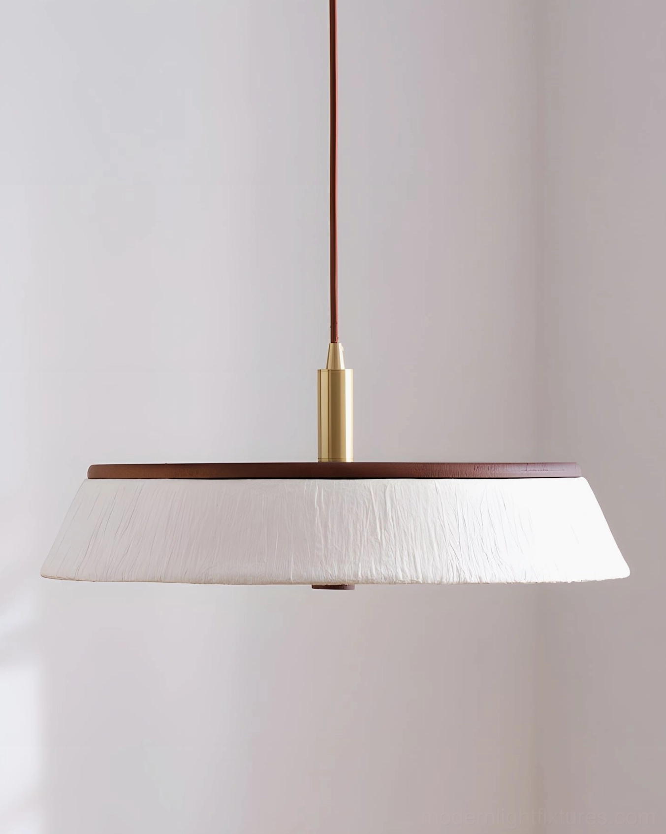 Warm-white LED bulb inside rice paper pendant light showing diffused light quality and even illumination