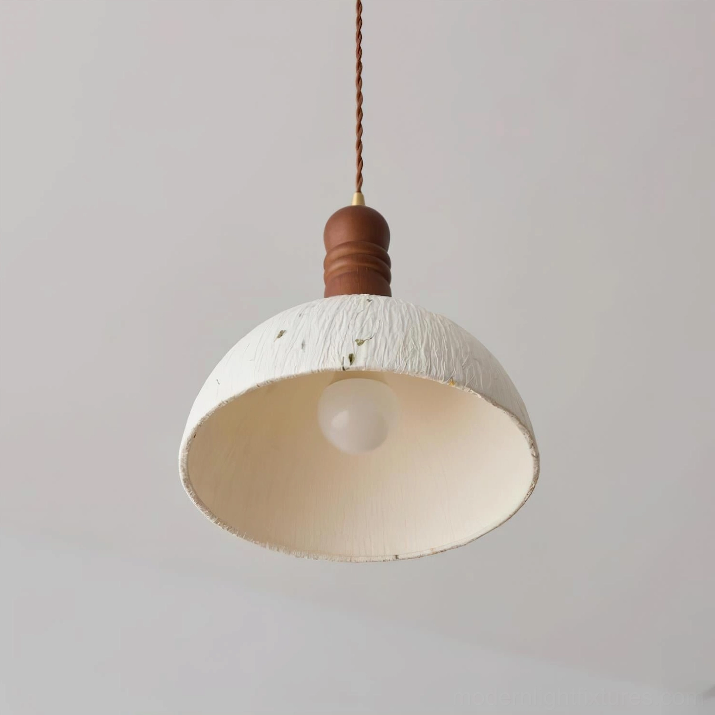 Speckled rice paper pendant shade detail showing handcrafted texture and light diffusion quality