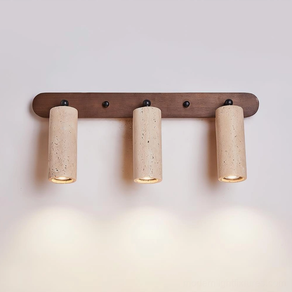 Ricerca 3-head travertine wall sconce in walnut and beige finish mounted above bathroom vanity