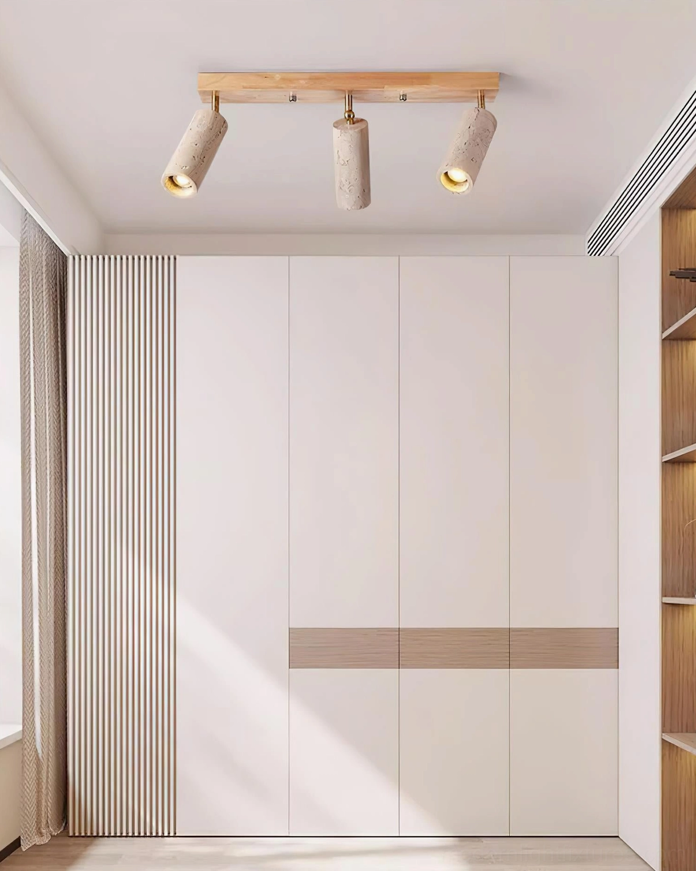 Minimalist walk-in closet with Ricerca 3-head track light, light wood rail and beige travertine shades providing neutral warm illumination