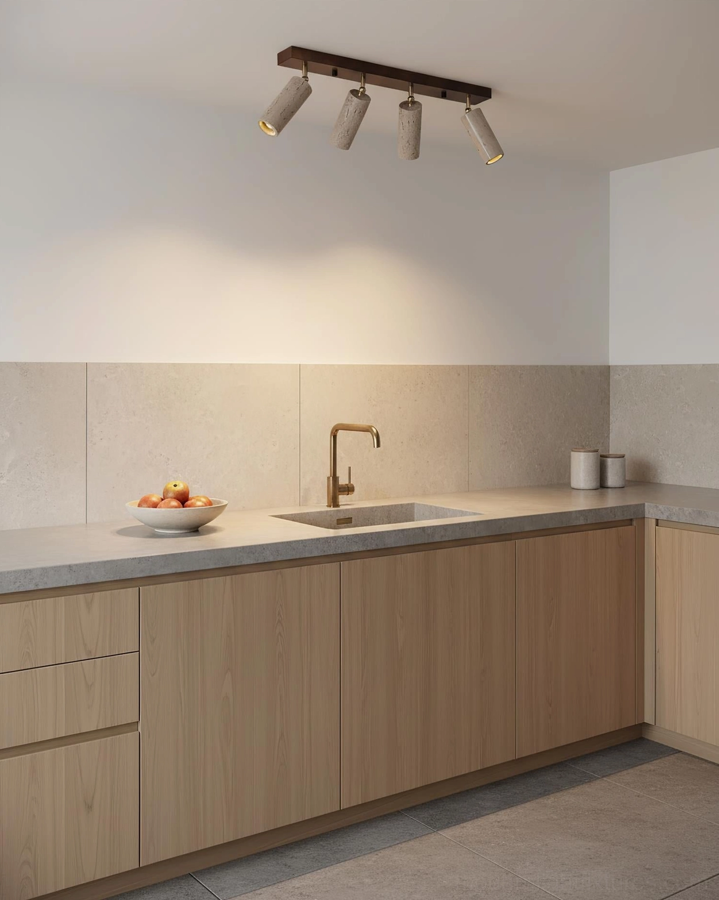 Contemporary kitchen with Ricerca 4-head track ceiling light, dark wood rail with matching travertine shades and warm task lighting