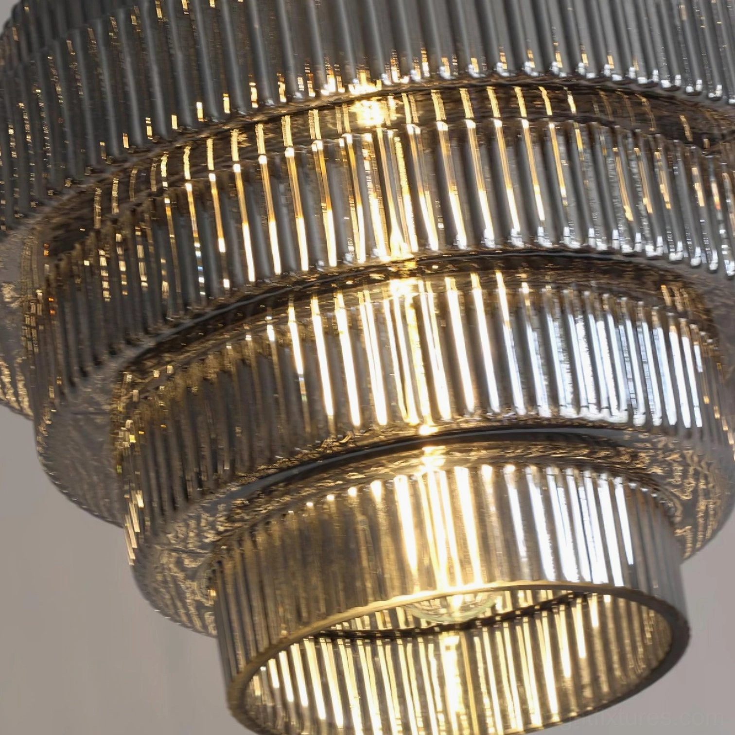 Ridged glass pendant light with warm light glow, atmospheric interior design application