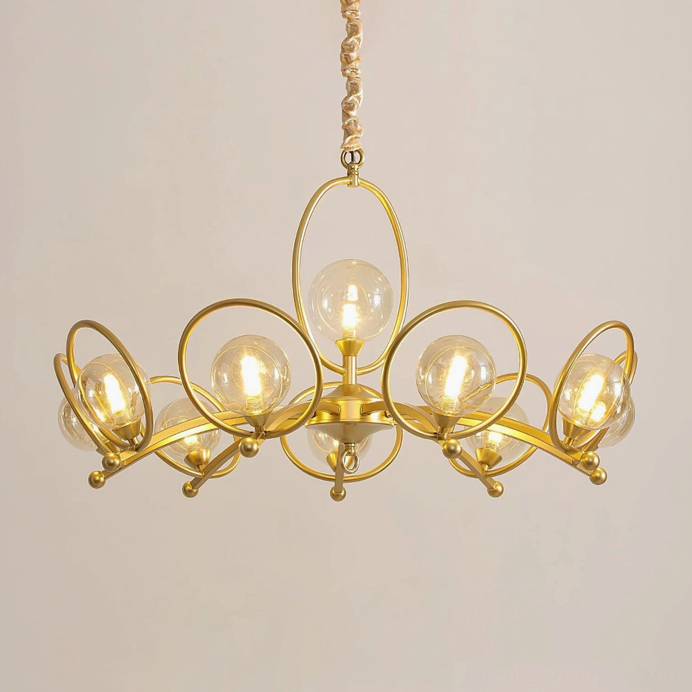 Riley glass chandelier showing light diffusion quality through opal frosted shades in modern setting