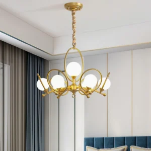 Riley modern multi-light chandelier installed in contemporary living room ceiling with curved brass arms and opal glass shades