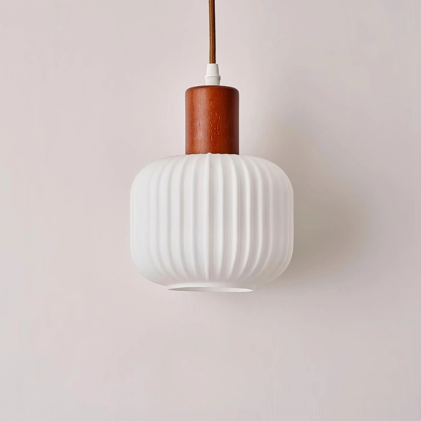 Rime modern pendant lamps installed in minimalist Nordic kitchen creating warm ambient lighting