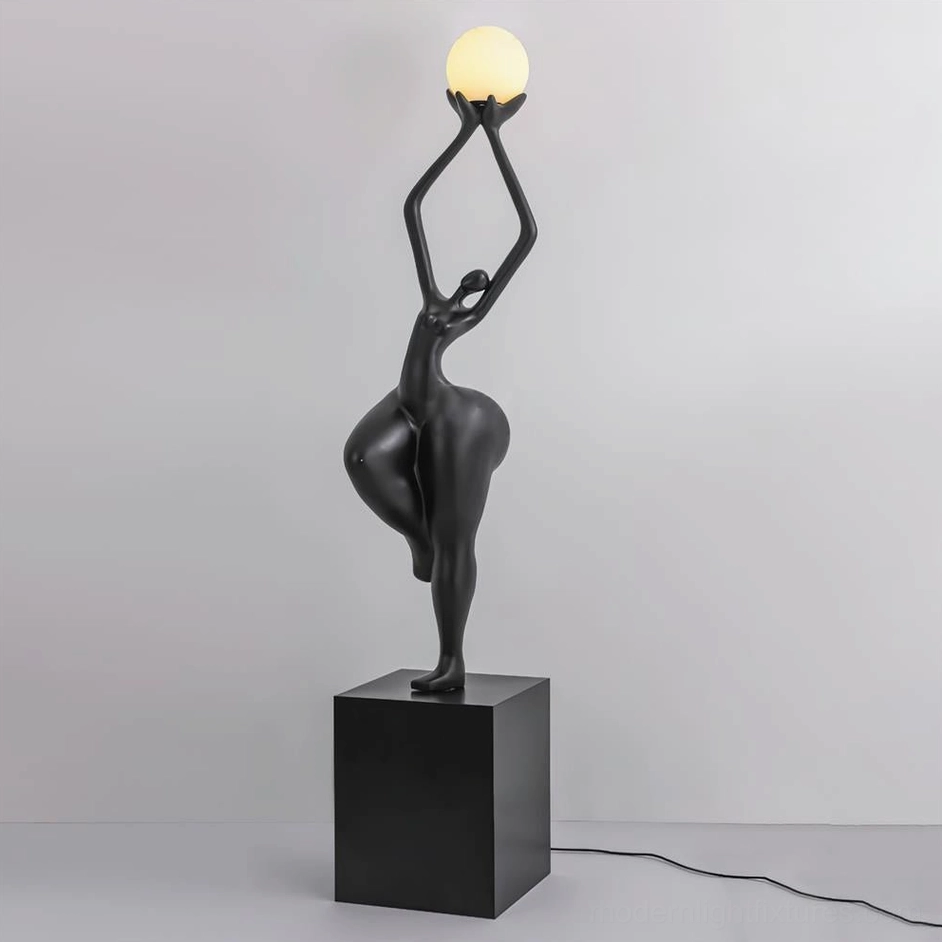 Black sculptural floor lamp featuring premium resin construction and glass sphere diffuser, modern art lighting