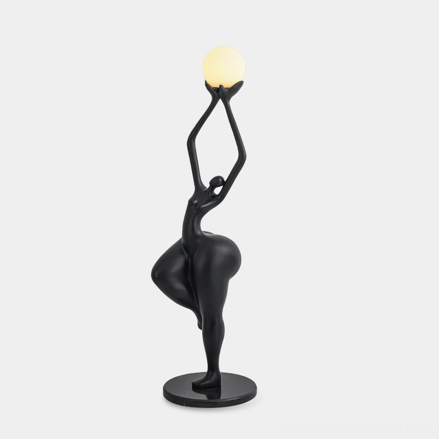 Rina modern sculptural floor lamp with matte black finish and spherical glass shade against white background, contemporary art lighting design