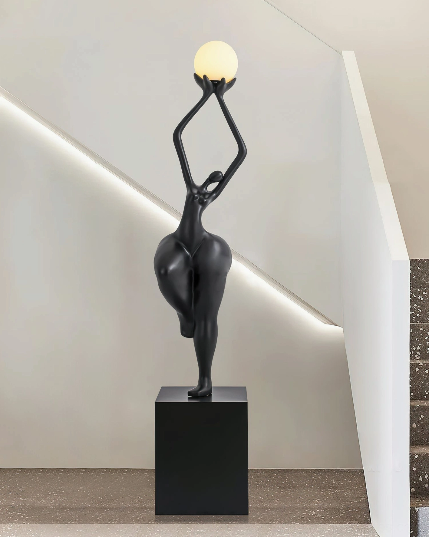 Rina modern sculptural floor lamp detail shot showing artistic craftsmanship and premium resin construction