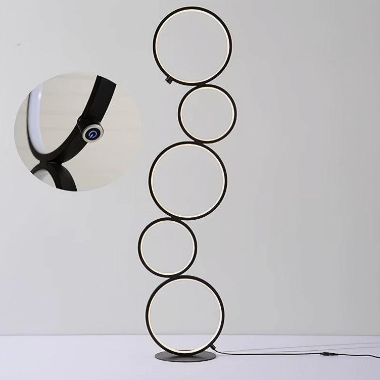 Contemporary circular floor lamp available in matte black and matte white finish options