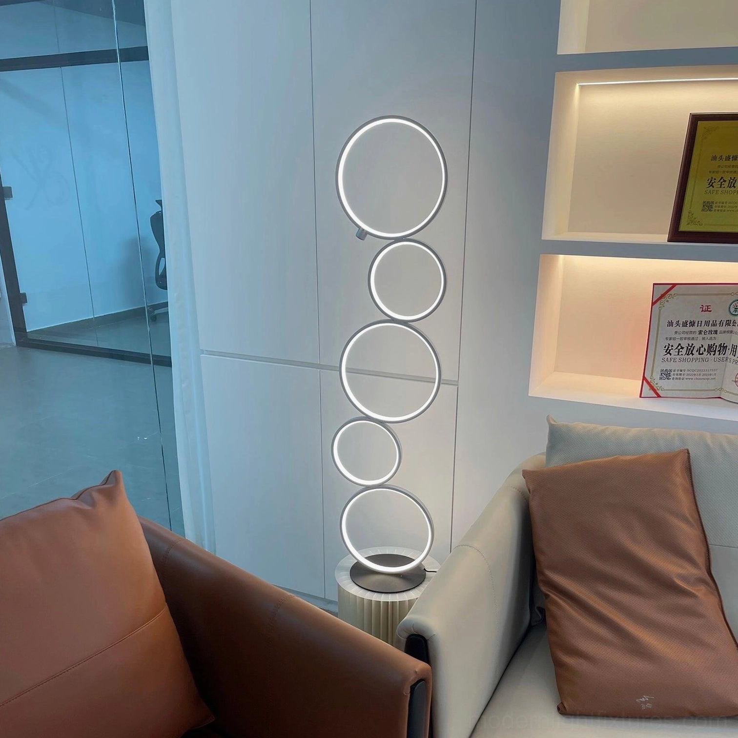 Contemporary minimalist floor lamp with extended power cord and multiple international plug options