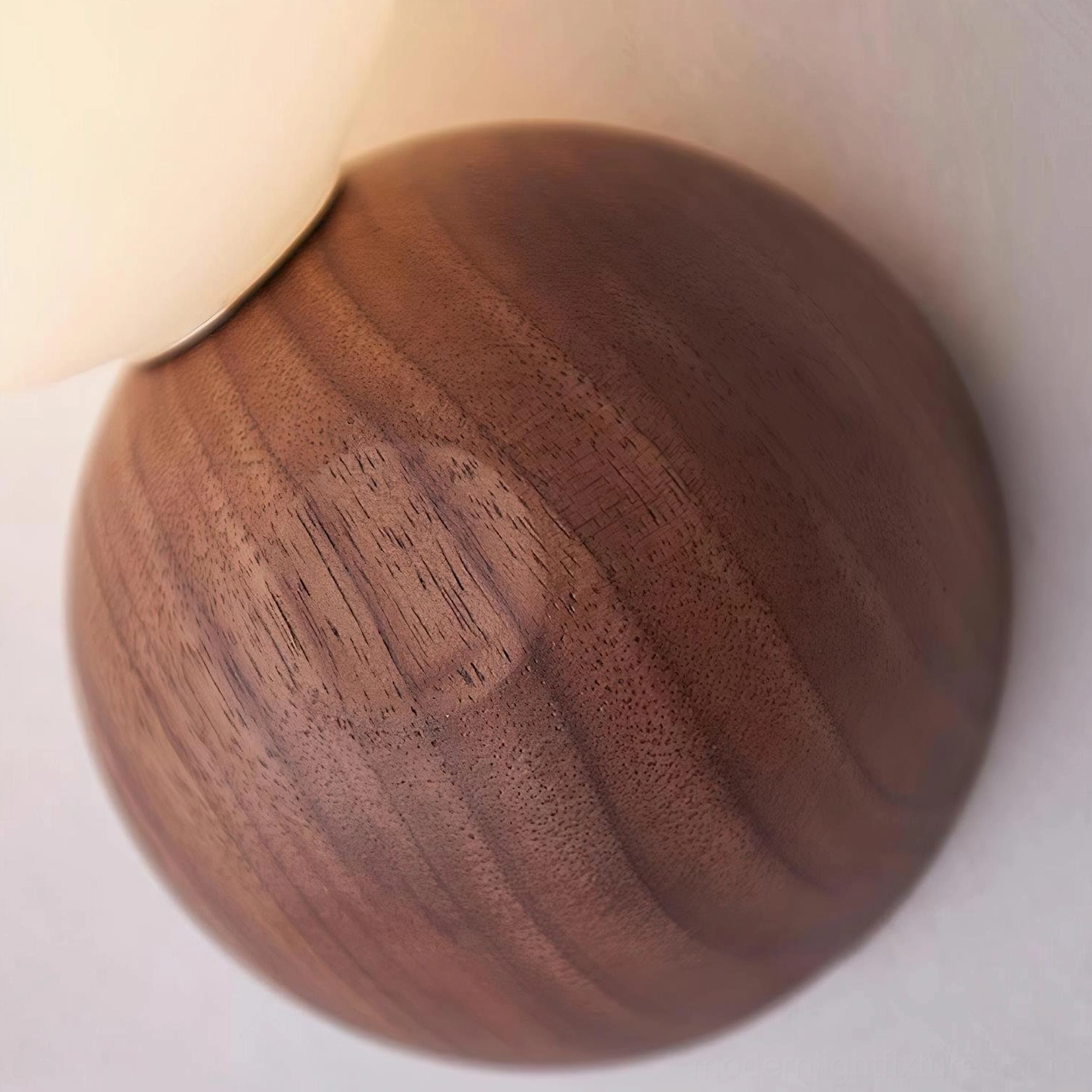 Ringo wood glass wall lamp showing opal diffuser luminosity and organic material aesthetic in contemporary home