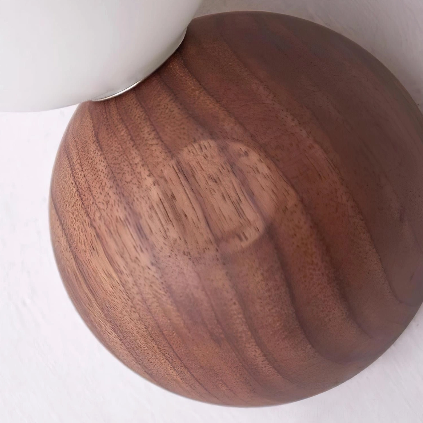 Ringo hardwired wall sconce in bathroom or damp-rated location showing versatility of modern sconce fixture