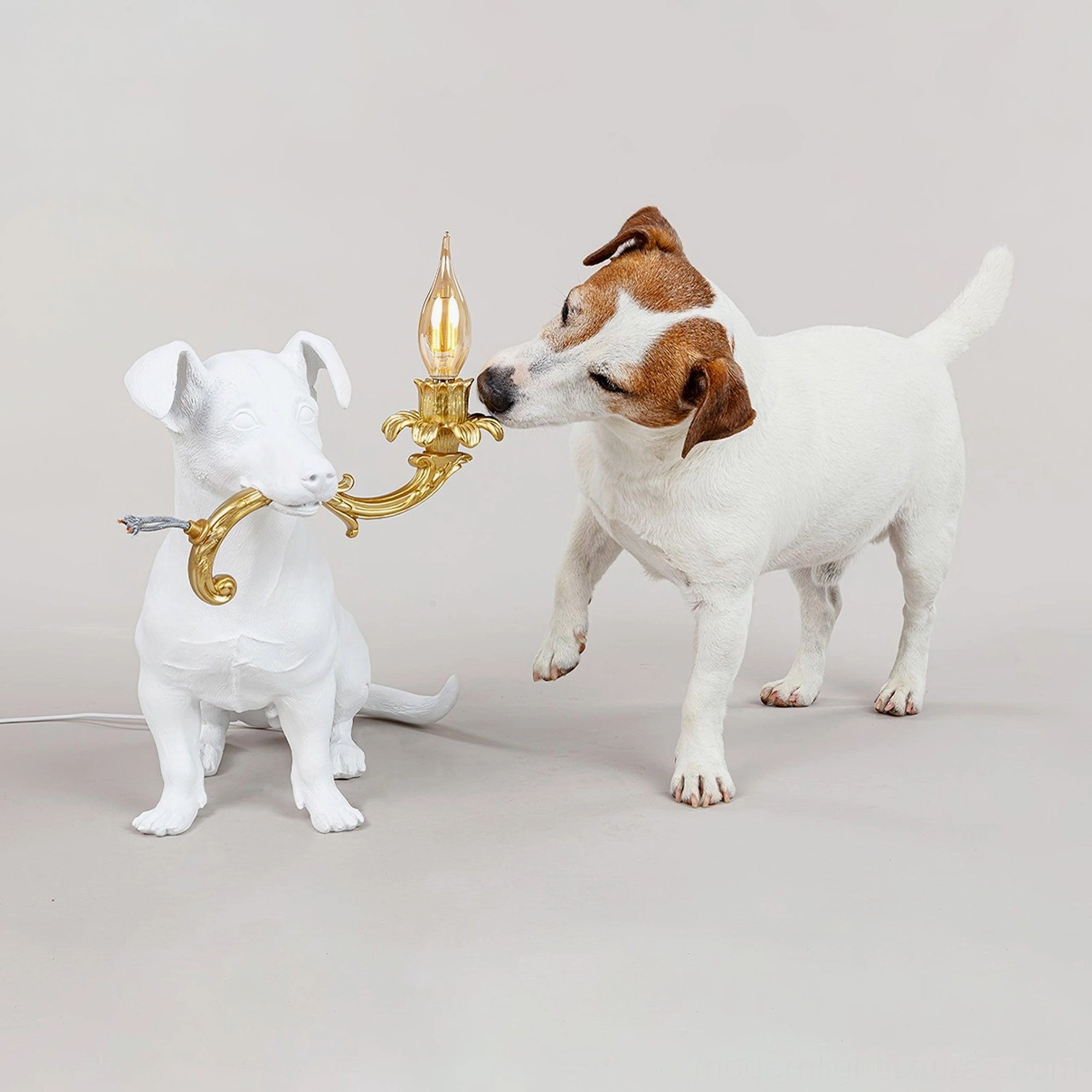 Two Rio dog table lamps, white and brown spotted decorative dog light fixtures, modern playful dual lamp arrangement