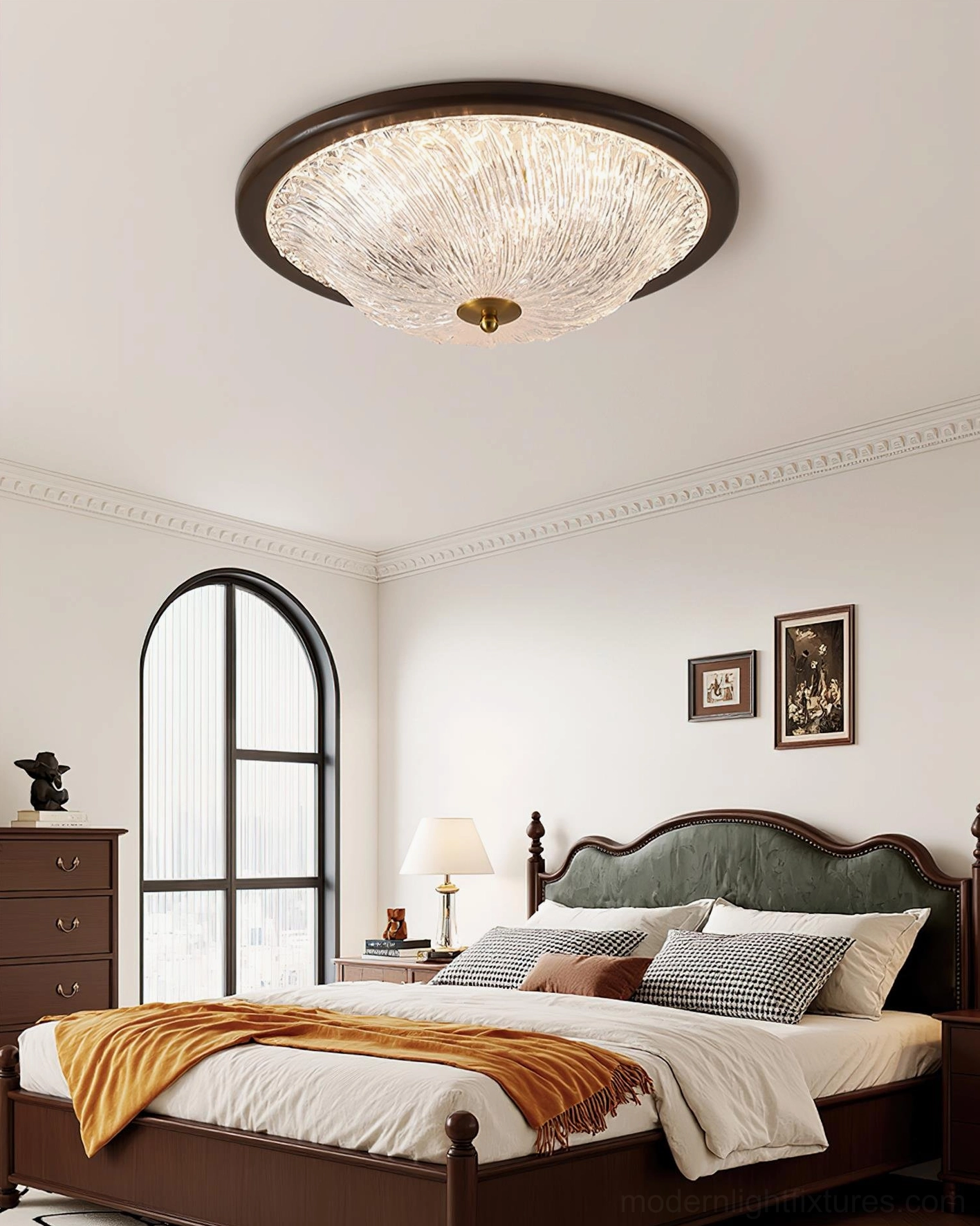 Ripple ceiling light fixture installed in vintage bedroom with arched window - dark wood frame warm illumination