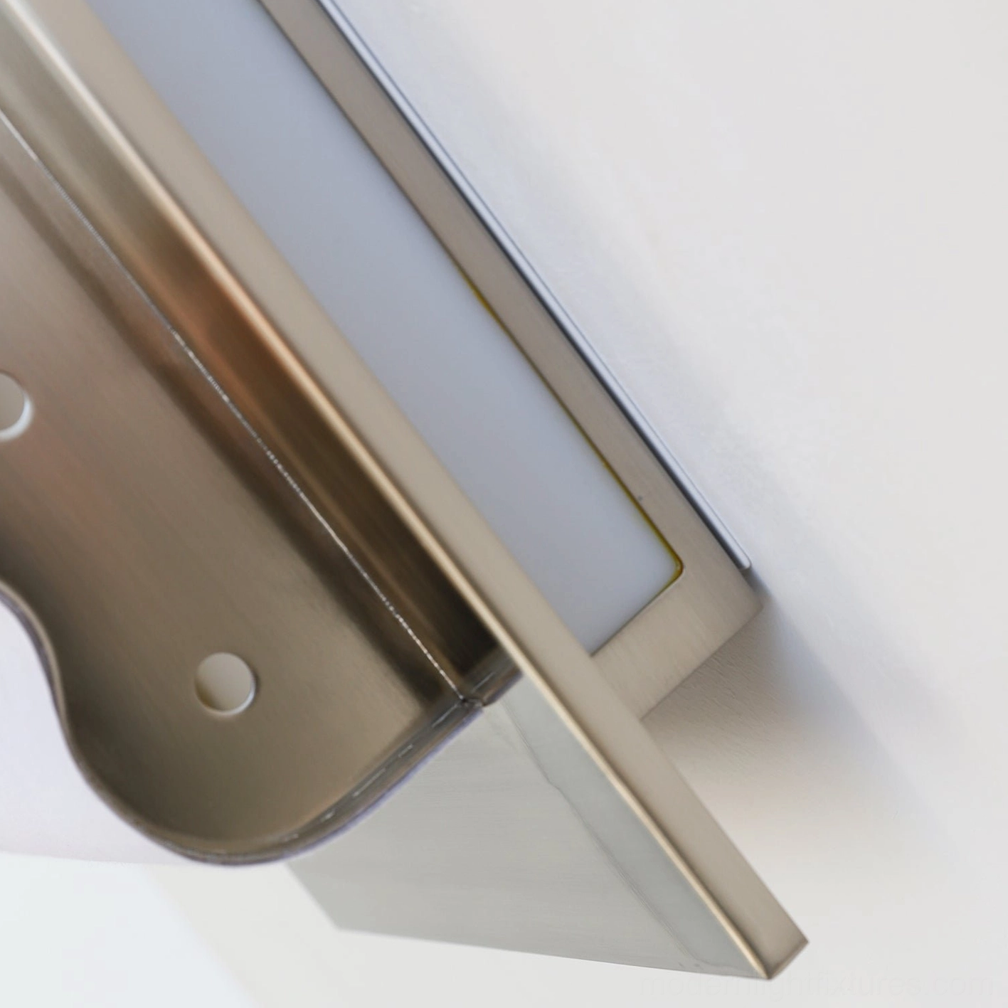 Ripple edge wall sconce sculptural wavy shade with brushed metal frame contemporary lighting fixture