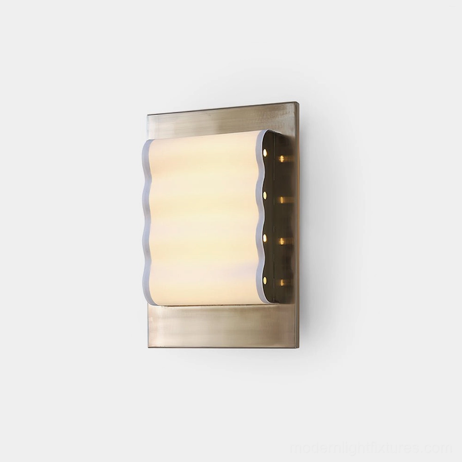Ripple Edge modern wall sconce with brushed silver metal frame and wavy frosted acrylic shade on white background