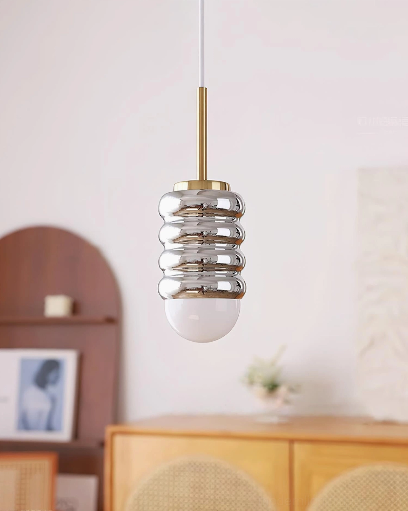 Ripple inspired pendant light with soft circular contours, warm glow illumination for modern interiors