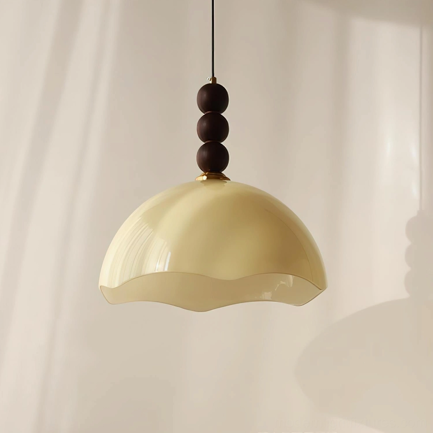 Close-up detail of rippled glass dome and brass hardware showing craftsmanship and texture of mid-century pendant light