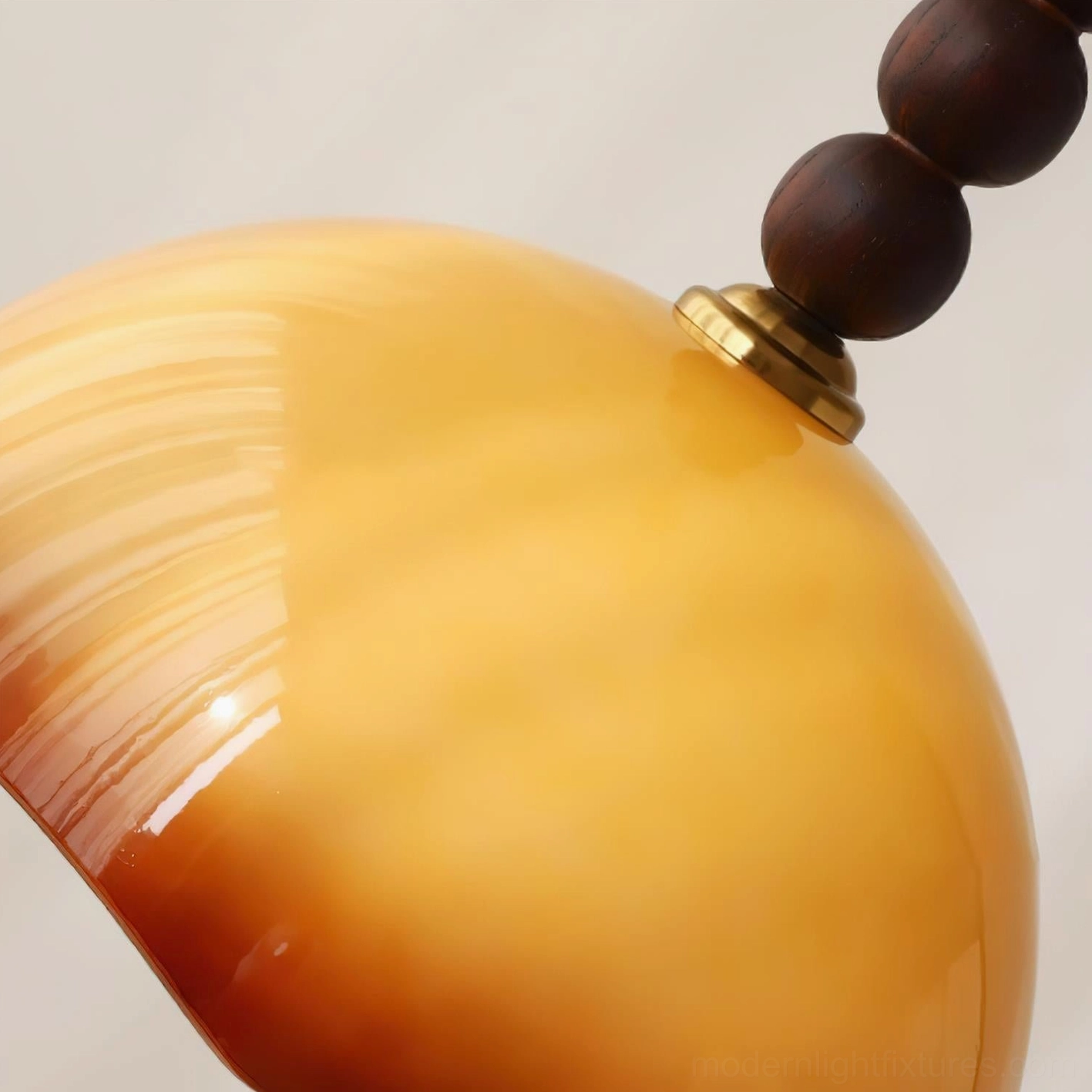 Rippled glass pendant light shade showing delicate wave pattern and hand-finished texture against backlit background