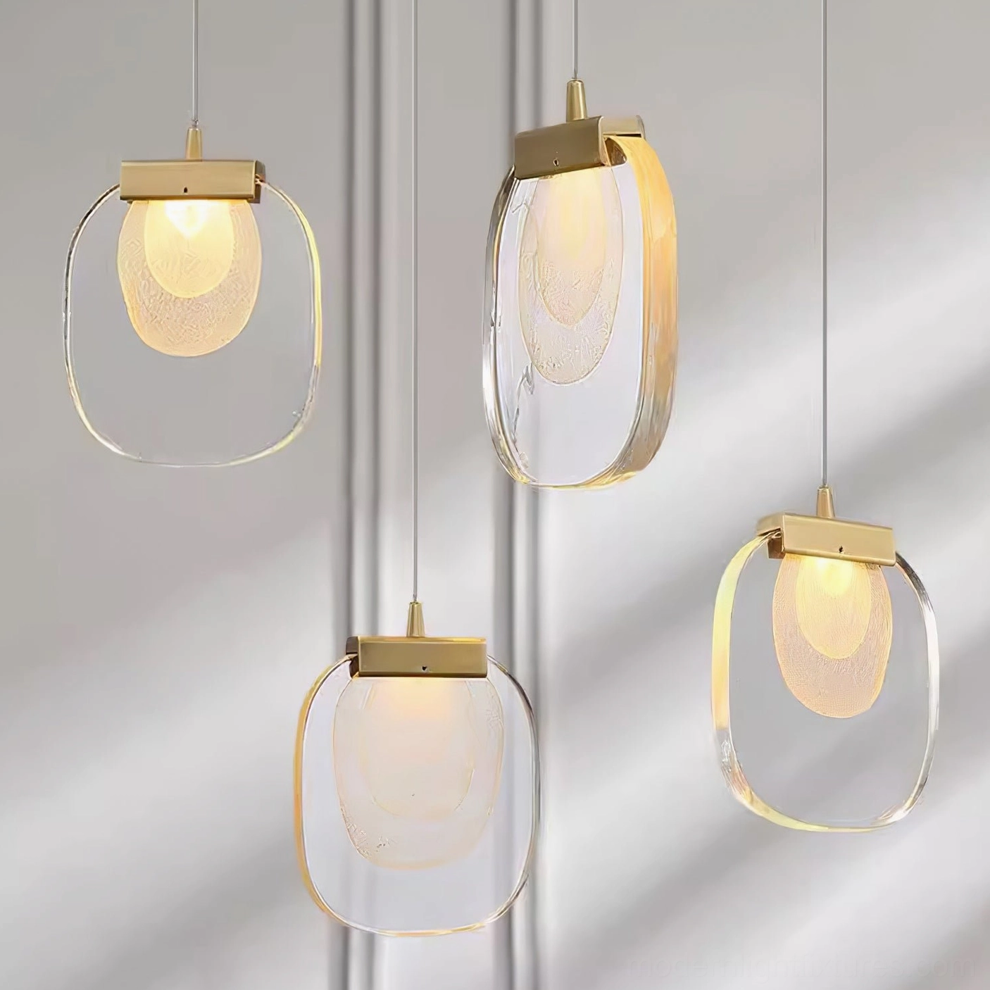 Handcrafted glass ripples pendant fixture close-up showing metal mounting and glass layers