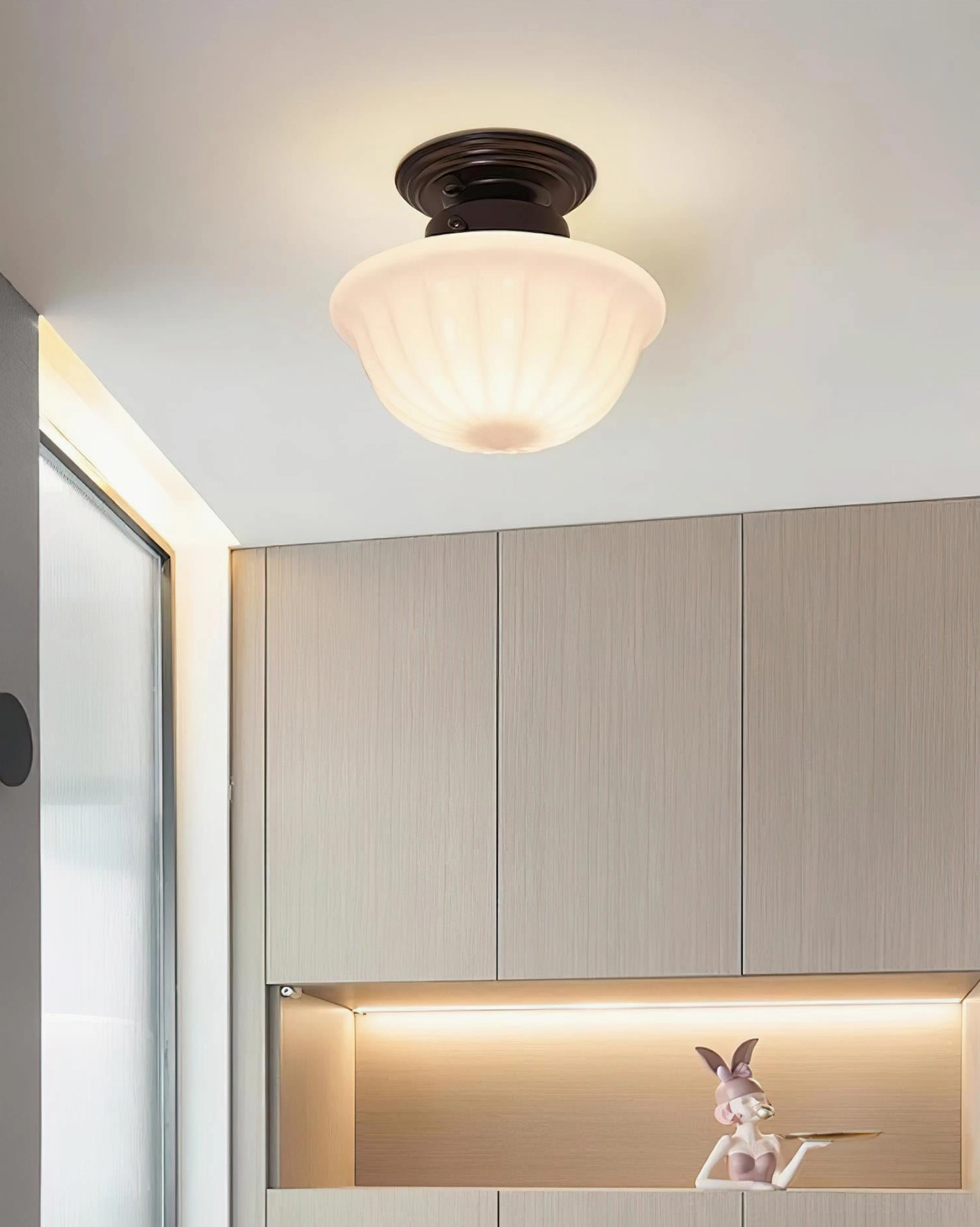 Ritten semi-flush ceiling light fixture mounted in kitchen above island countertop