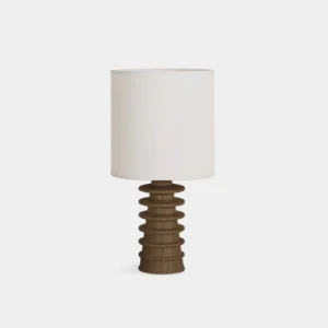 Rivaro modern table lamp with tiered ribbed wooden base and off-white fabric shade, front studio view