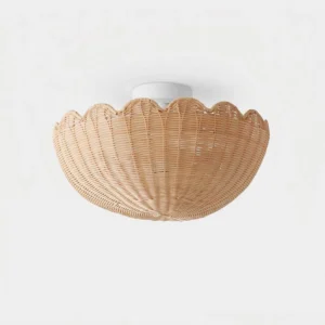 Rivela scalloped rattan flush mount ceiling lamp - front studio view showing hand-woven shade design