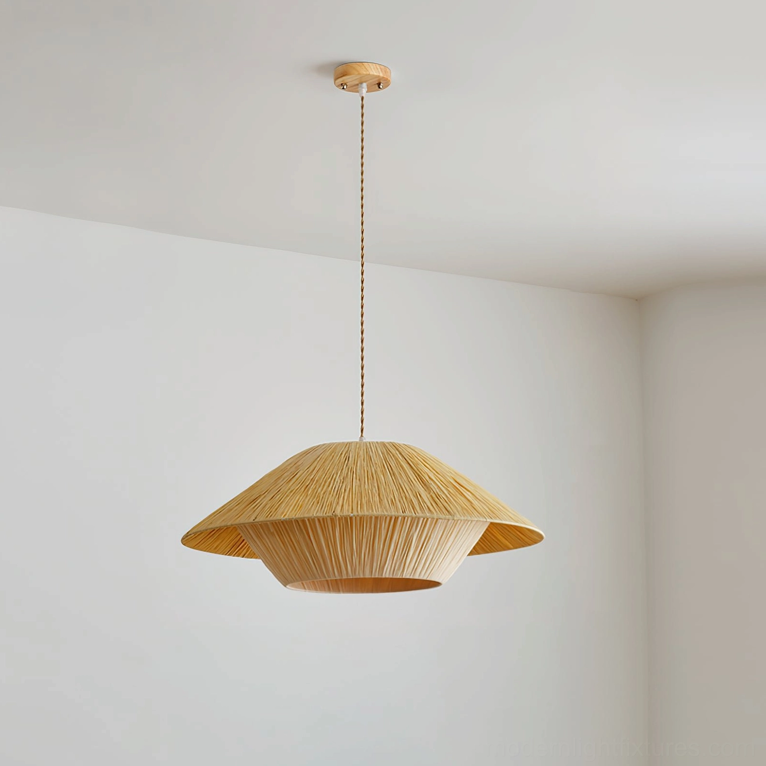 Rivora natural raffia pendant light - small 50cm size variant with wood mount in studio setting