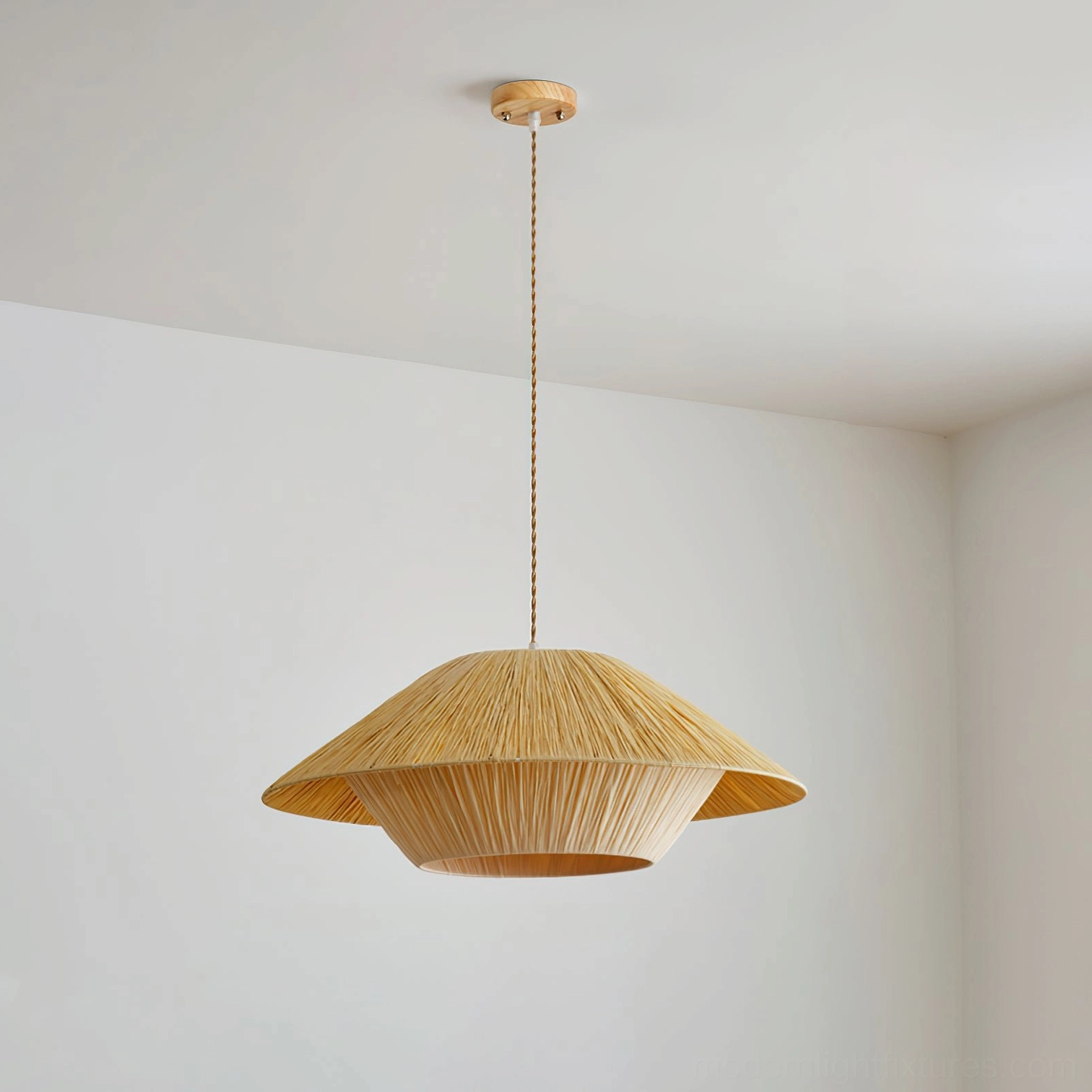Low angle view of Rivora woven pendant lamp showing natural light brown hat-shaped shade design