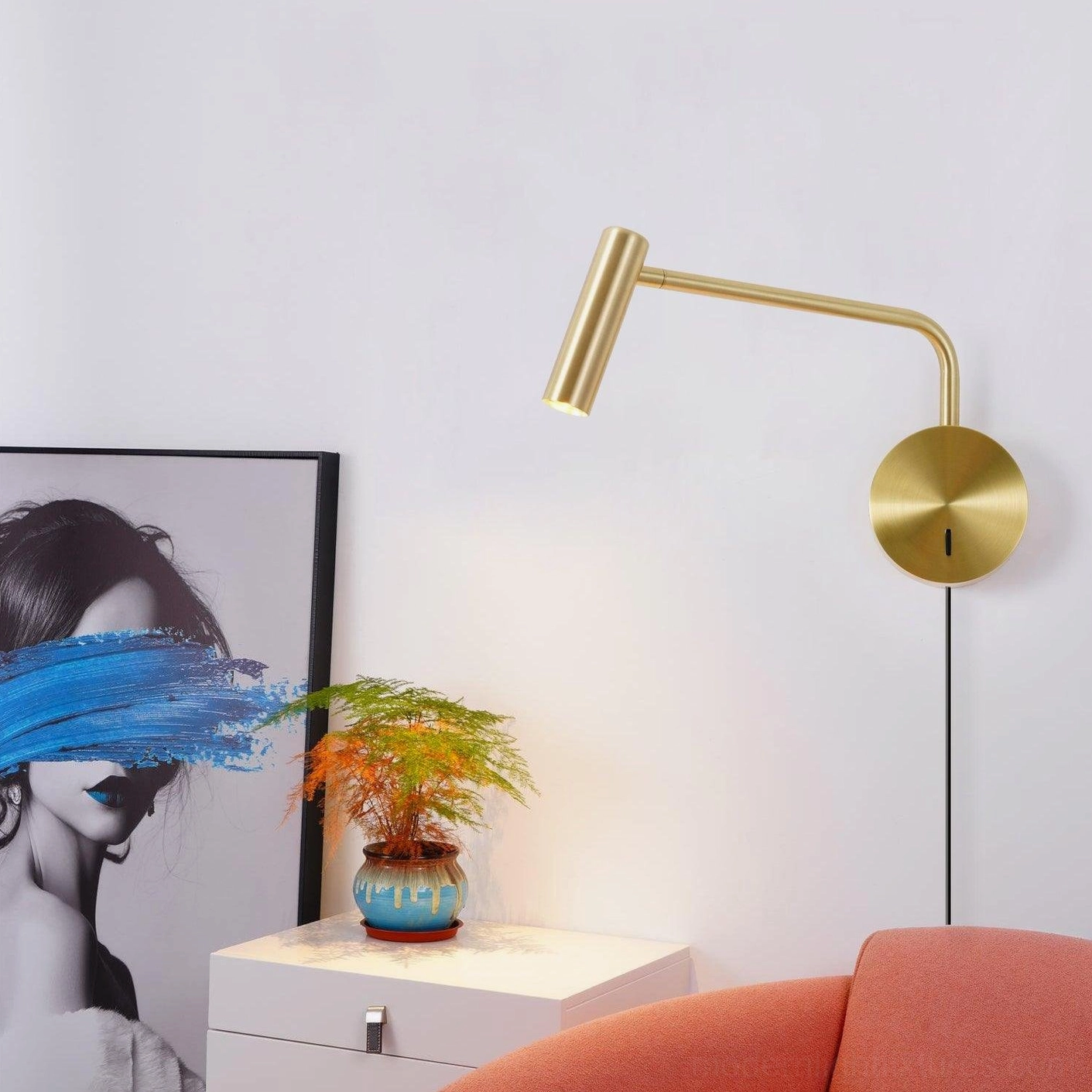 Rizo wall reading lamp brushed gold finish mounted in modern living room side table setting