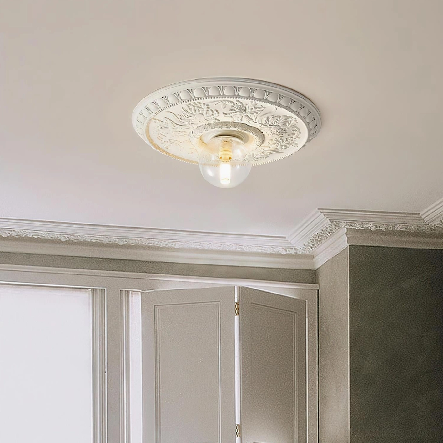 Rochelle flush mount ceiling light in classic bedroom with off-white finish and ornate relief details