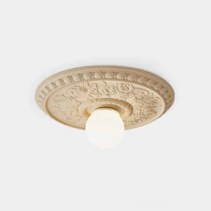 Rochelle neoclassical carved ceiling light fixture with intricate floral relief detail and exposed G9 bulb on white background