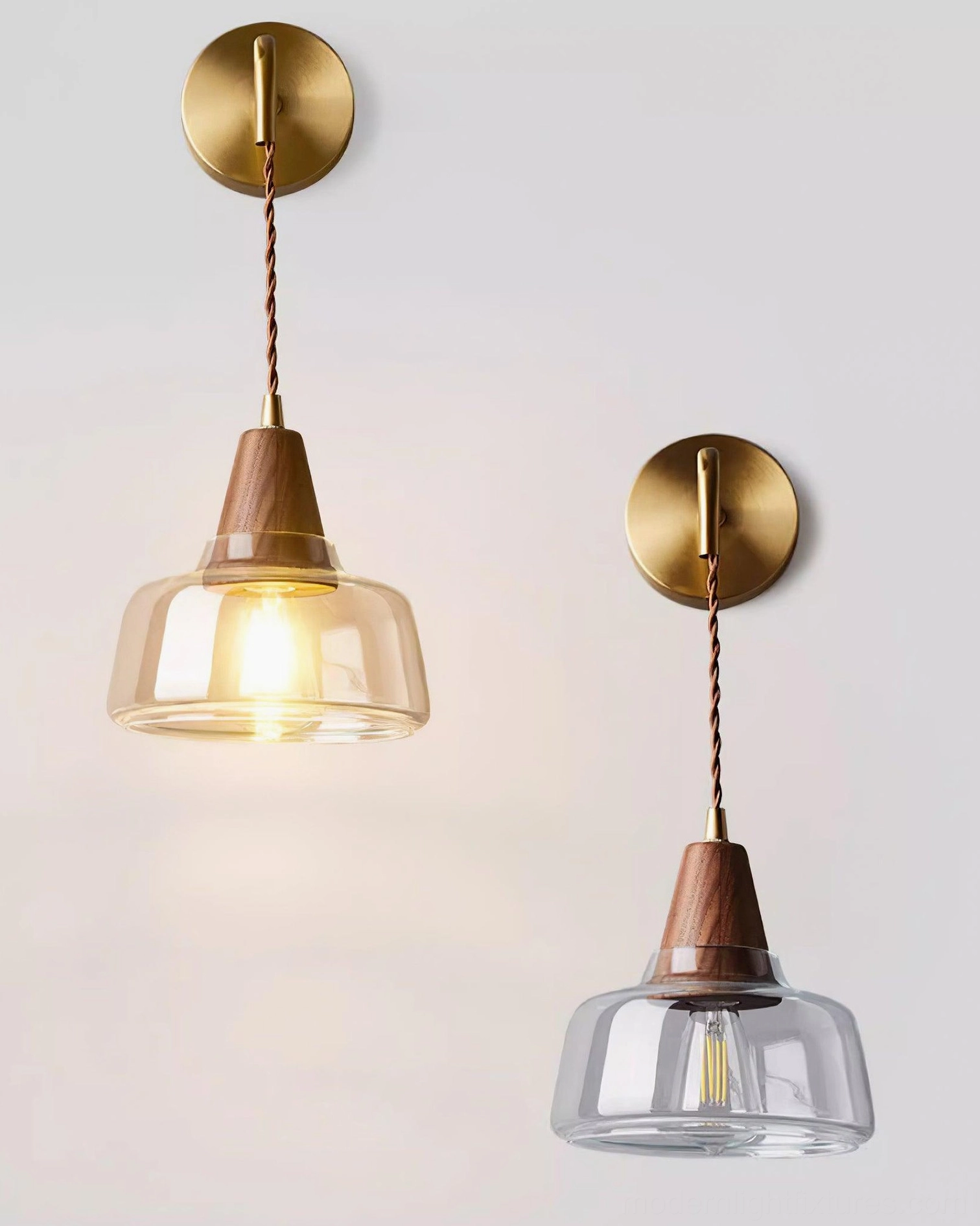 Pair of Rockford plug-in wall sconces flanking bedroom headboard - symmetrical vintage brass lighting setup